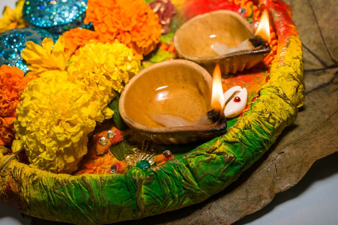 Diwali flowers and diyas for a warm Happy Diwali 2026 greeting