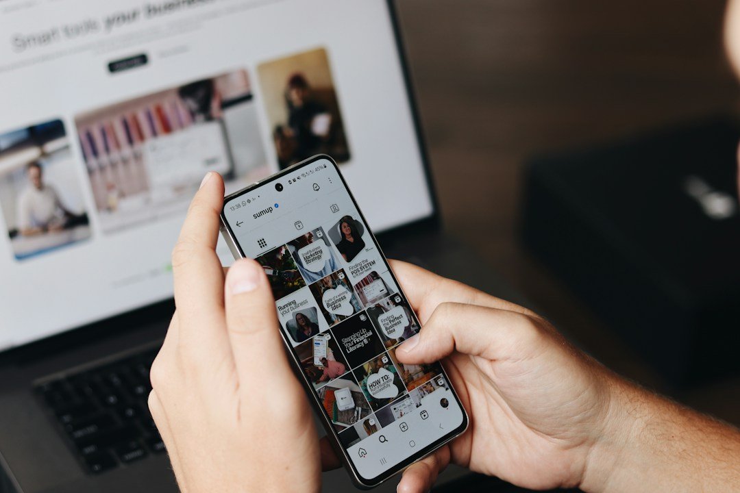 Creator using a smartphone and laptop for social media content and online product recommendations