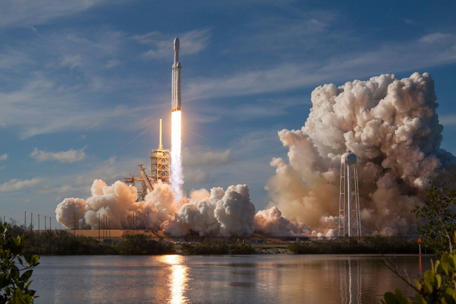 Rocket launching into the sky for World Space Week 2026 theme Rocket Revolution